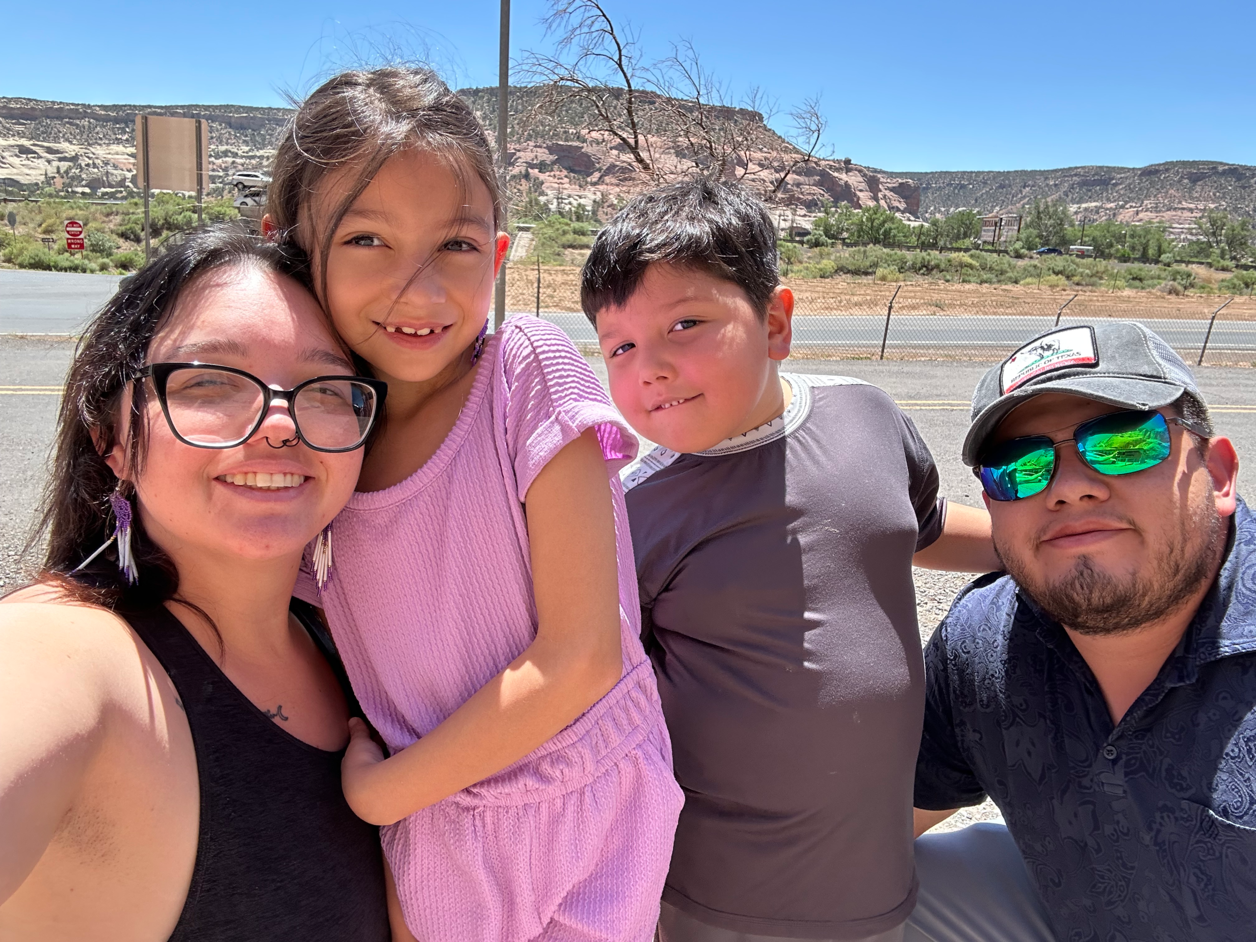 Sam Nevarez with his family on a sunny day